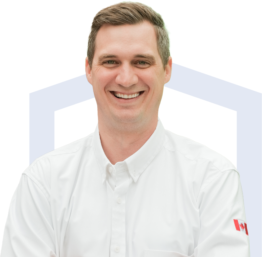M&K team member in his white uniform, smiling broadly with teeth visible. M&K team member in his white uniform, smiling broadly with teeth visible.