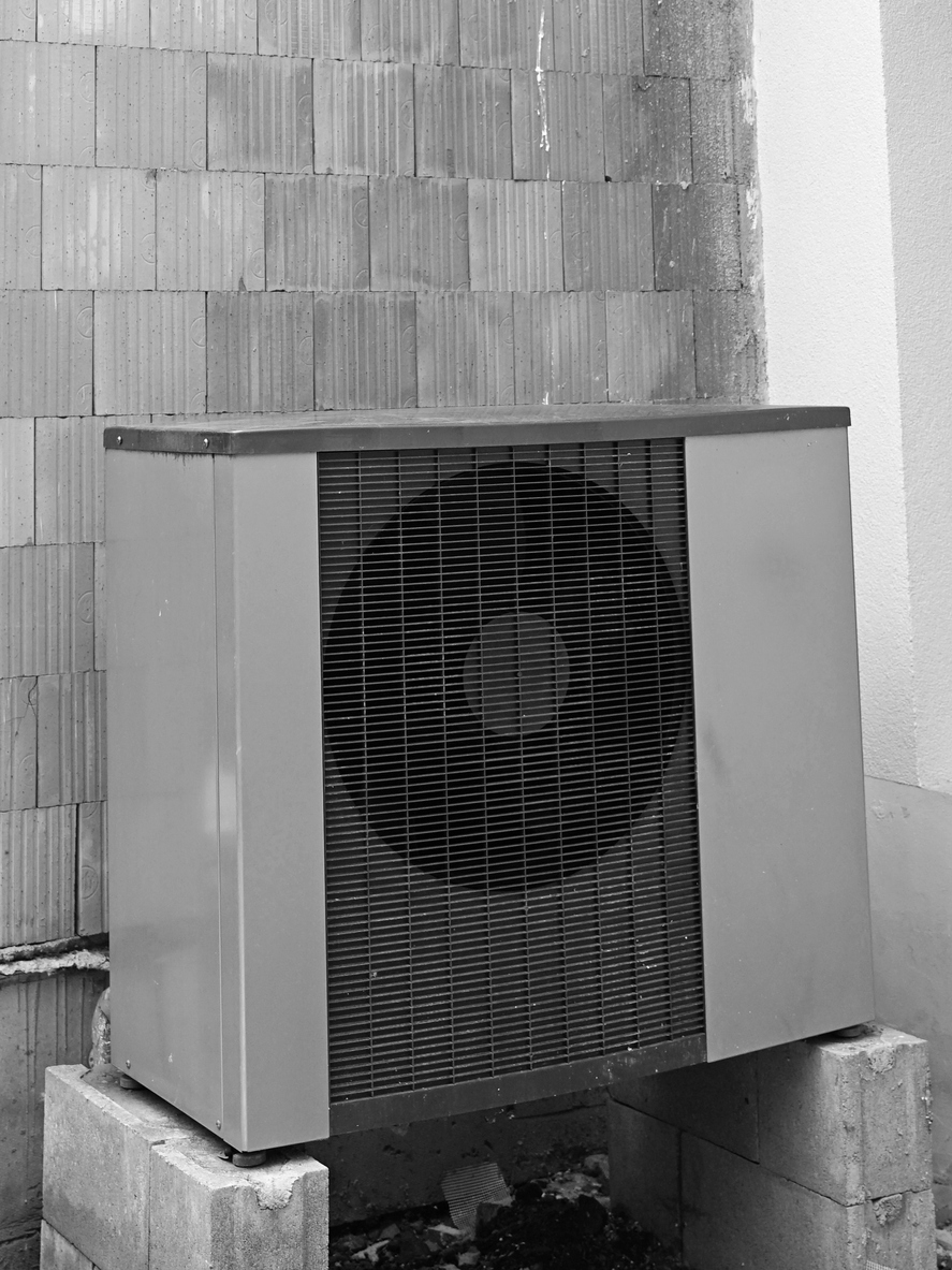 Efficient heat pump reduce living cost in modern house of future, green renewable energy concept Efficient heat pump reduce living cost in modern house of future, green renewable energy concept