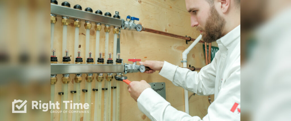 HVAC technician adjusting boiler valve in London home to fix boiler that won't turn off when thermostat stops calling for heat, surrounded by pipes and fittings